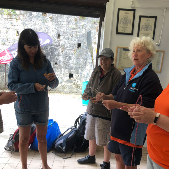 women tying knots